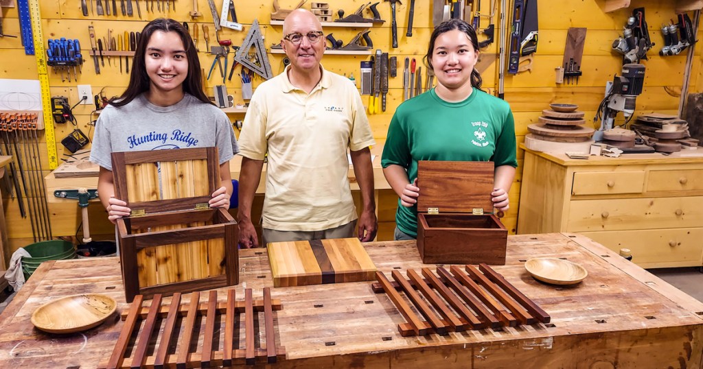 Inspired by a class at school, twins travel 12 hours to earn Woodwork merit badge